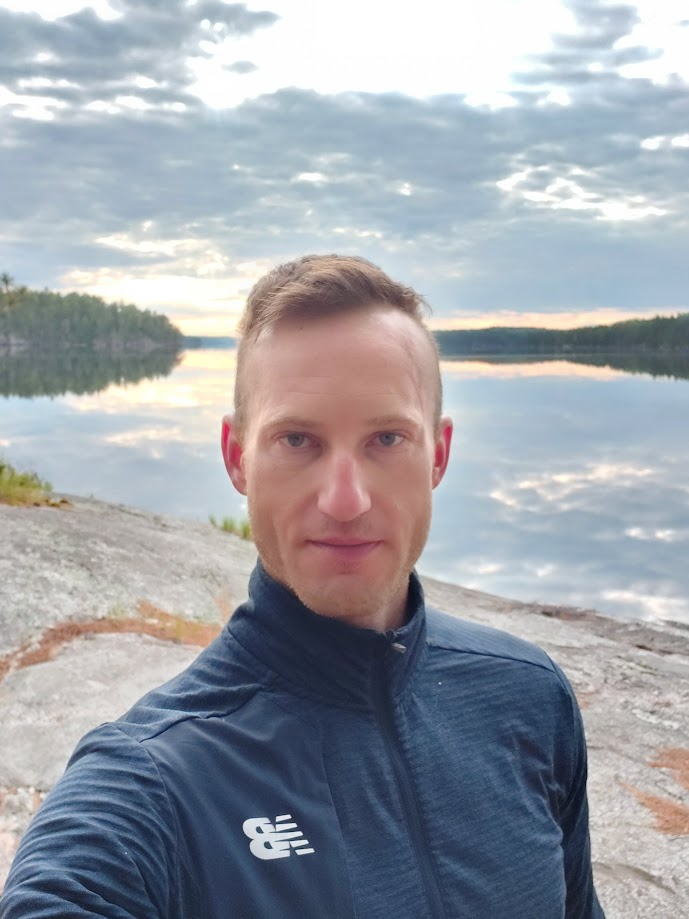 Picture of Colin Langedock wearing a blue button-up shirt